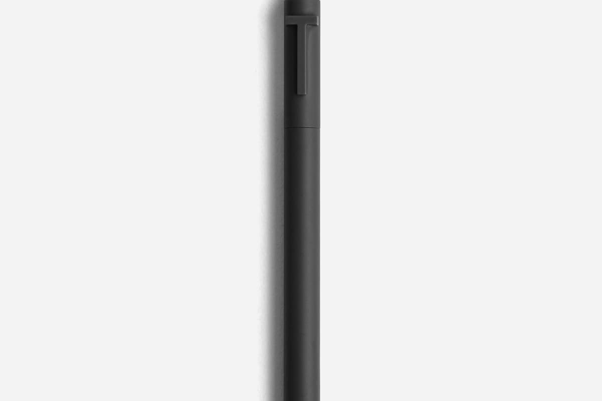 Fisher Space Pen bullet pen in matte black finish showing closed and posted states